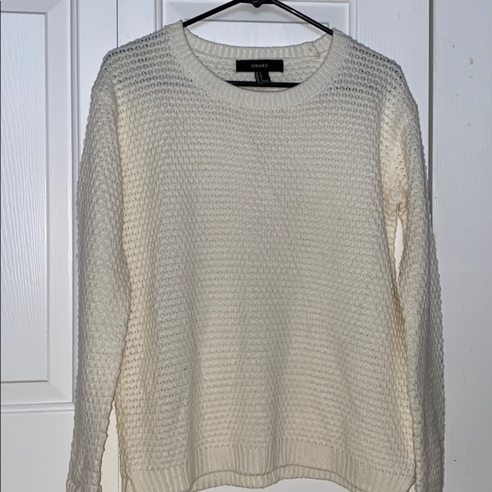 Knitted cream sweater